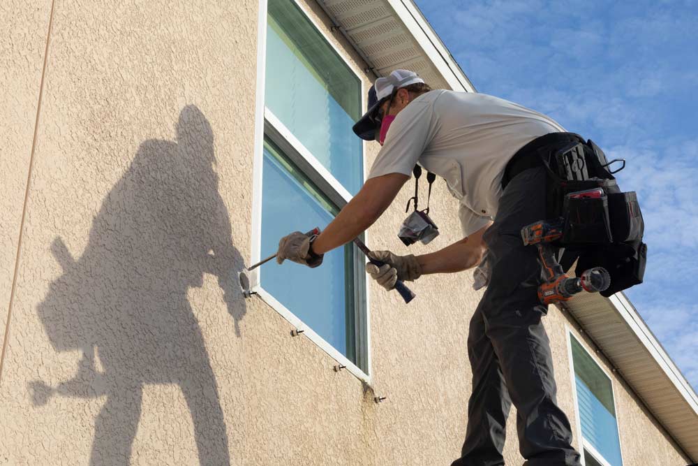 Oz Inspections gathering stucco core samples